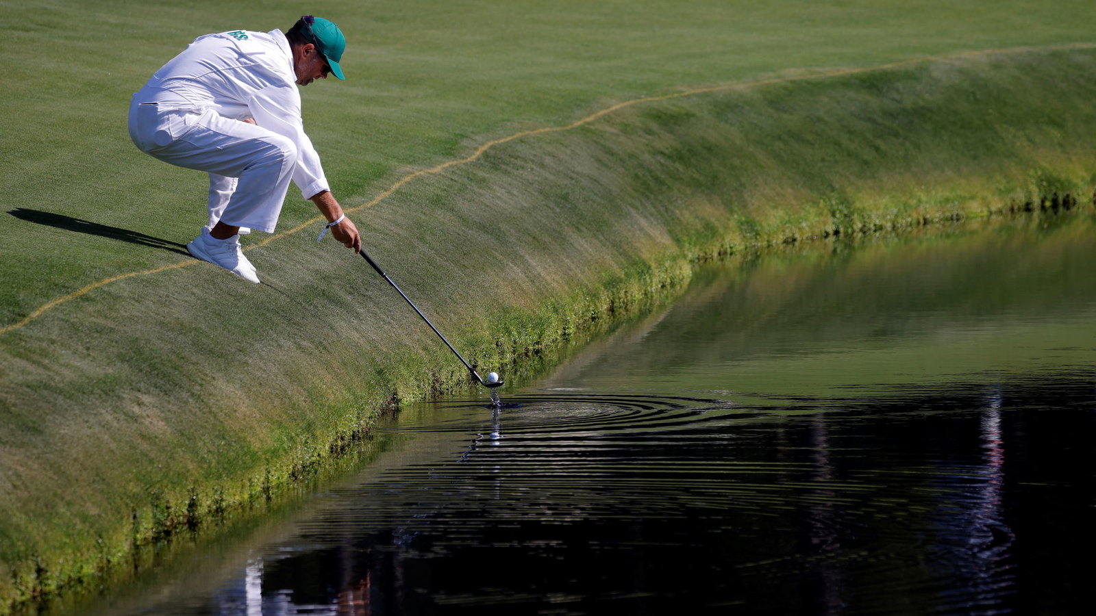 Arsenal legend Paul Merson finds the water at The Masters