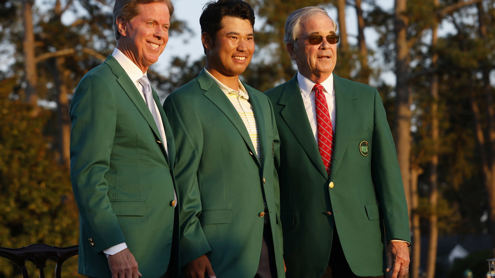 Golf fans react as Hideki Matsuyama is seen with his green jacket at the airport