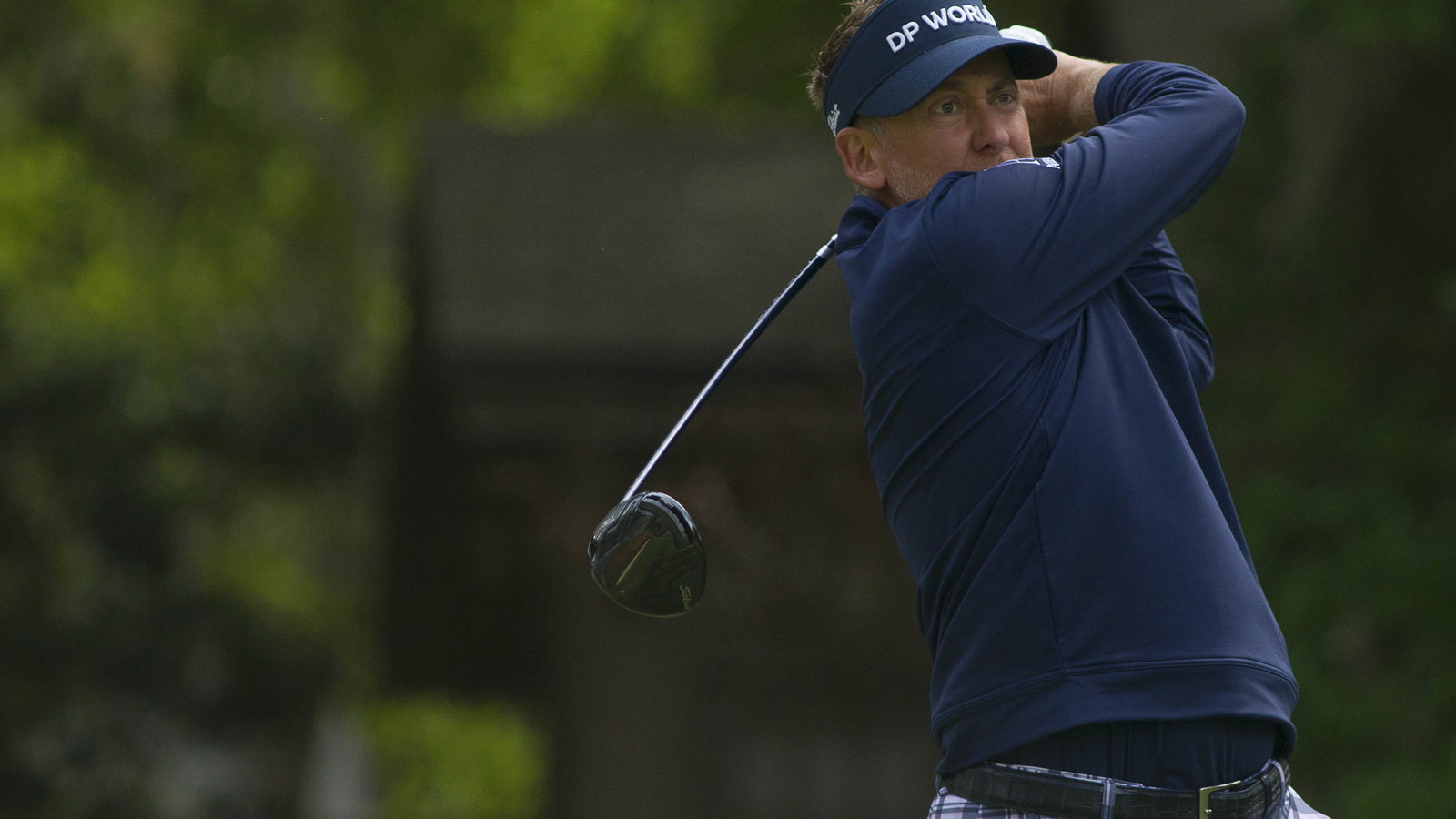 Golf fans react as Ian Poulter watches F1 DURING last round at the RBC Heritage