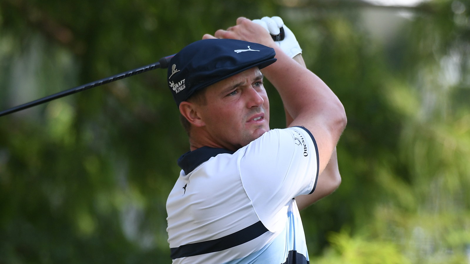 Bryson DeChambeau signs driver head for young fan at BMW Championship