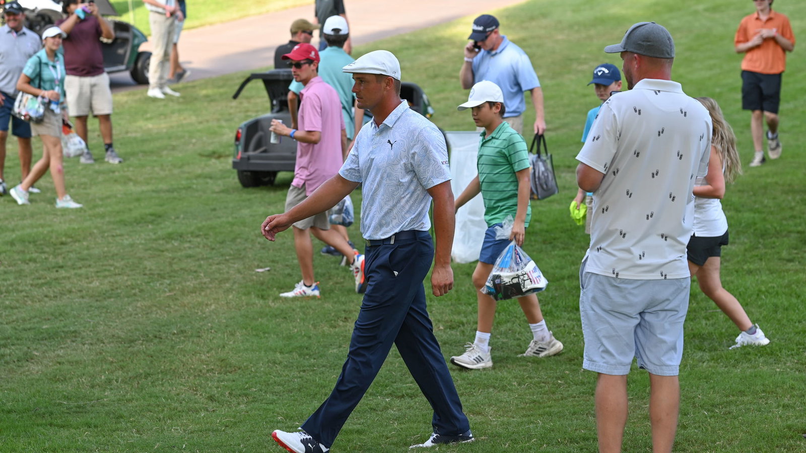 Golf fan SNATCHES Bryson DeChambeau's golf ball at the Tour Championship