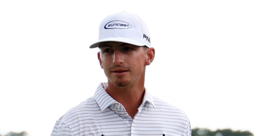 Caddie caught peeing in the azaleas as Tiger Woods walked past at The Masters