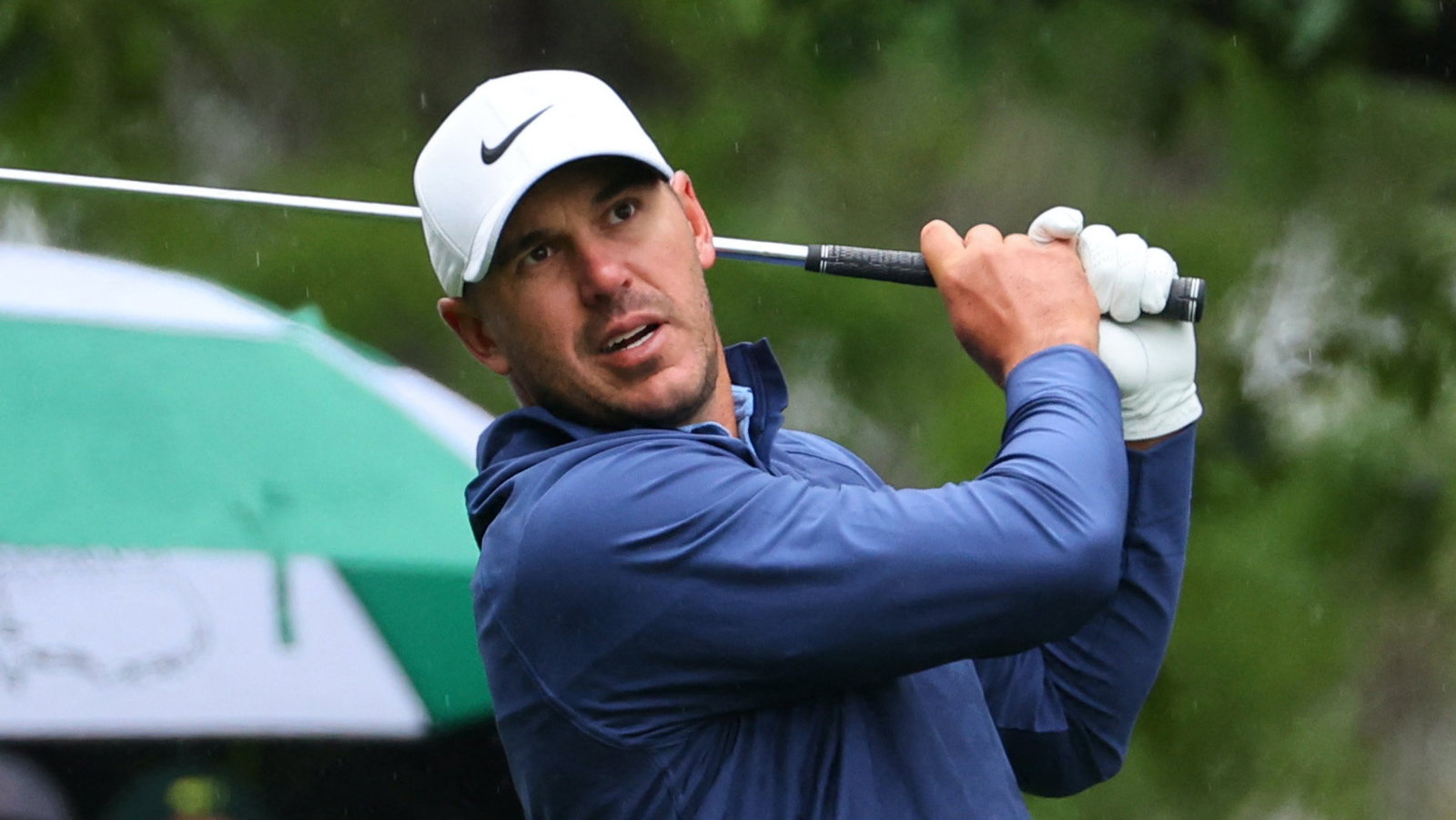 Brooks Koepka extends Masters lead as third round is suspended by weather