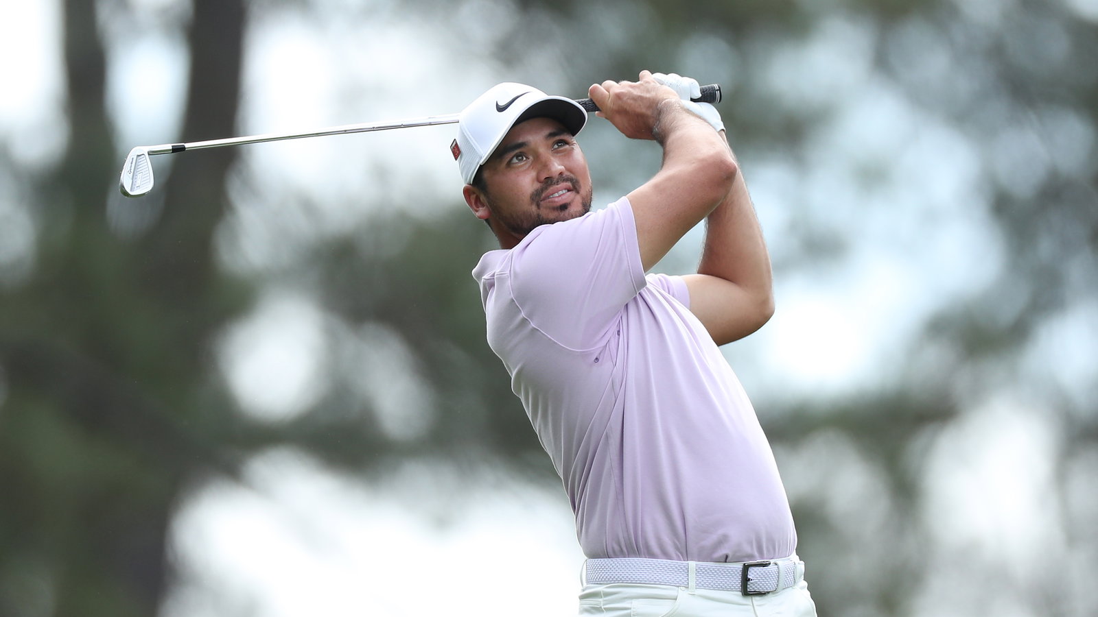 Jason Day bounces back from injury to share Masters lead