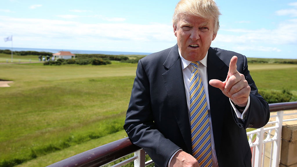donald trump golf course vandalised by protest group