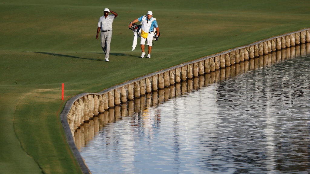 vijay singh caddie quits, refuses to explain why
