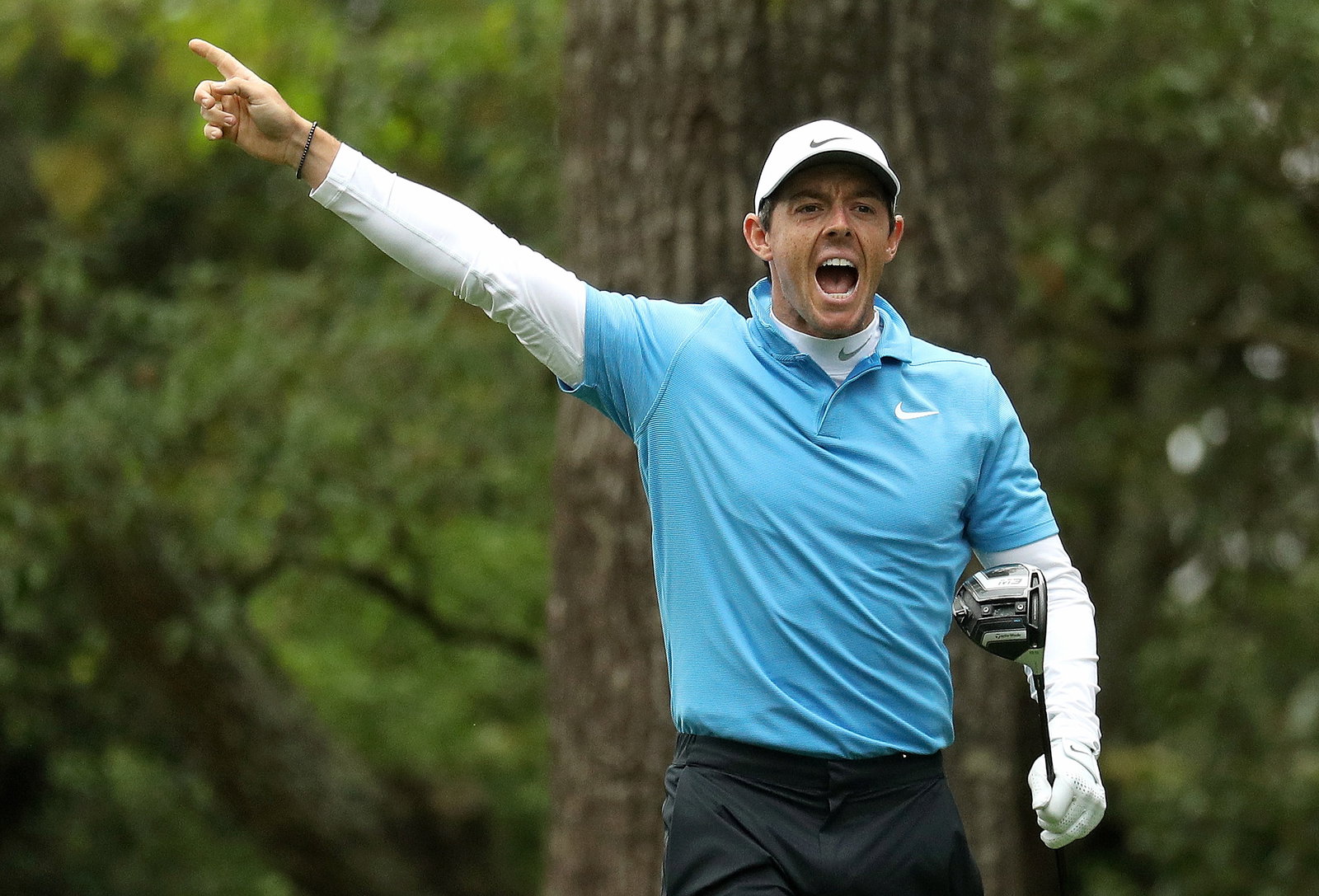 Why is the giant Peter Crouch using such small golf clubs?