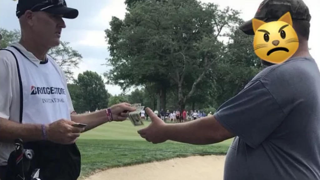 Tiger Woods’ caddie paid a heckler $25 to leave the WGC-Bridgestone!