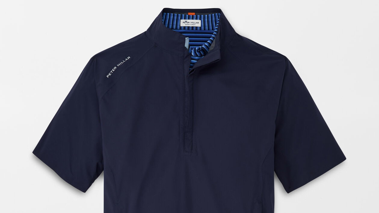 SHIELD SHORT SLEEVE HALF ZIP RAIN SHELL