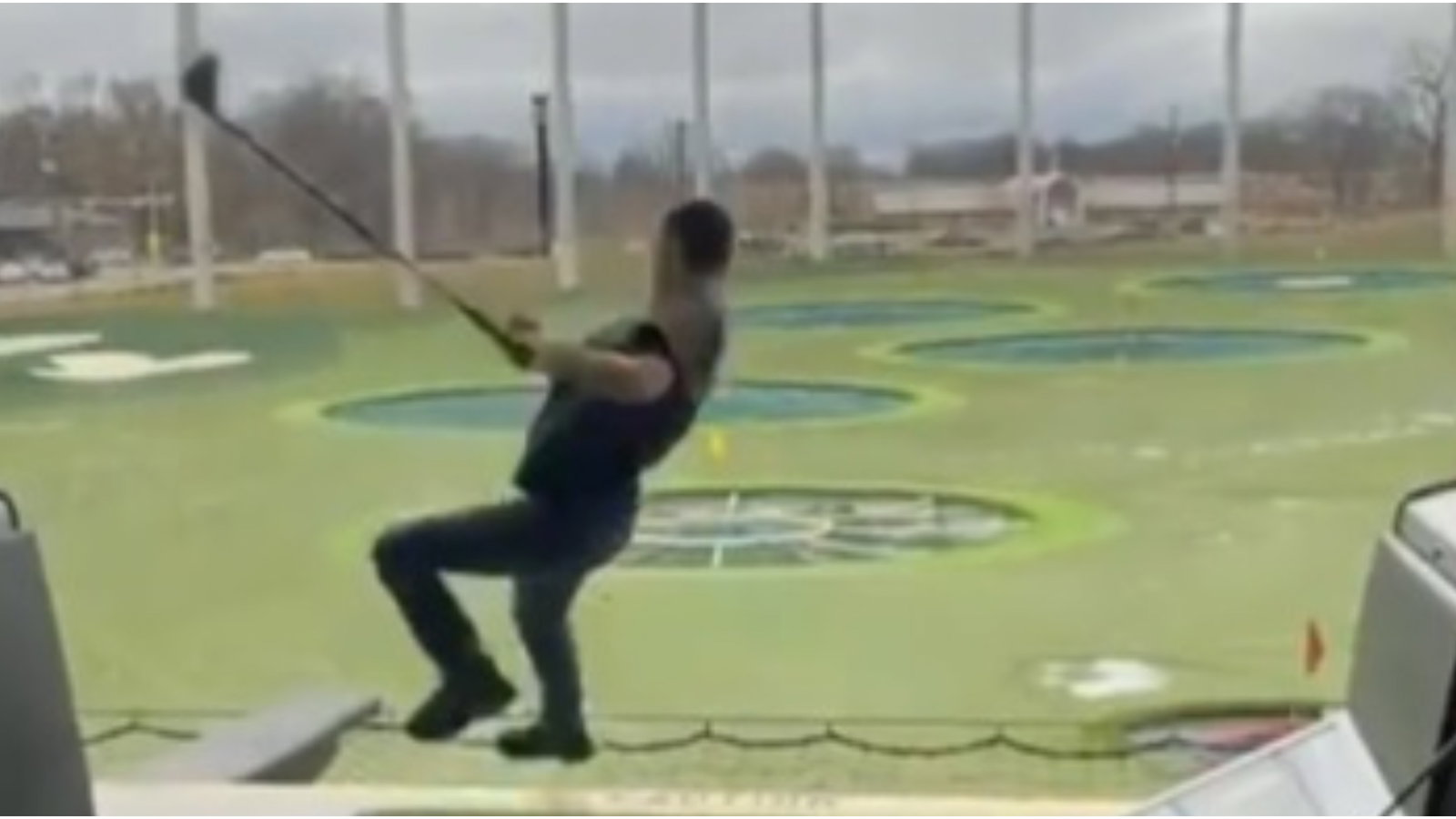 Topgolf user attempts HAPPY GILMORE but does a 360 into the nets