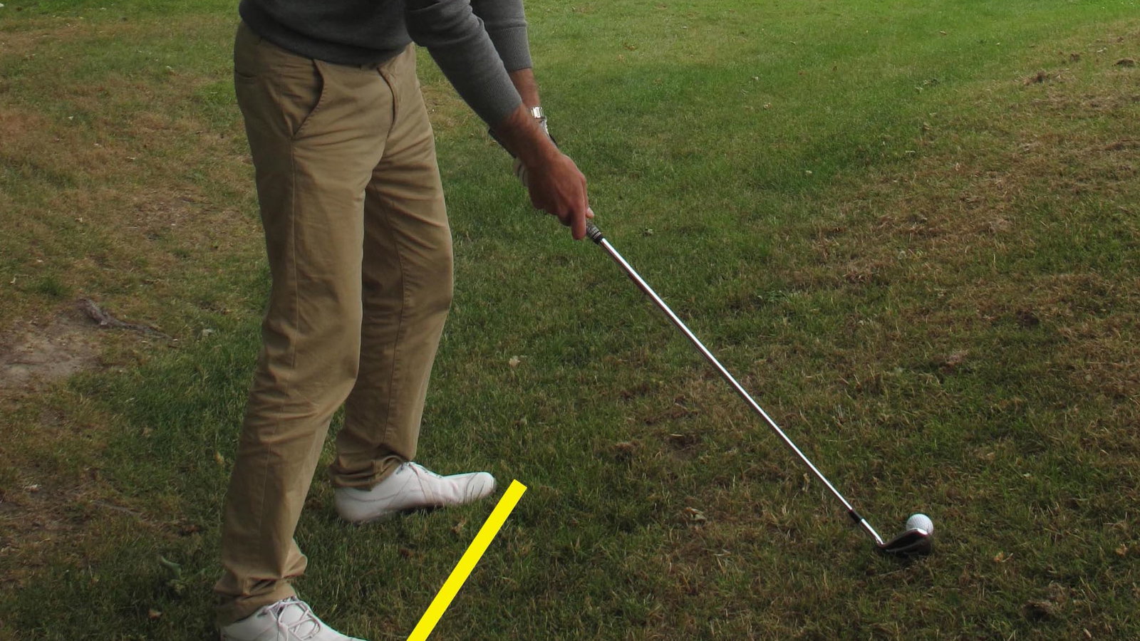 how to play golf shots when ball above feet