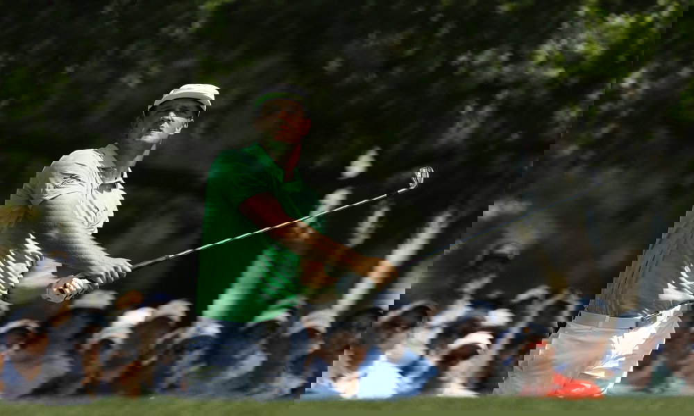 Jason Day re-injures back bending down to kiss his daughter at Masters