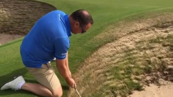 EPIC FAIL! Man attempts Tiger Woods 'on his knees' Open bunker shot...