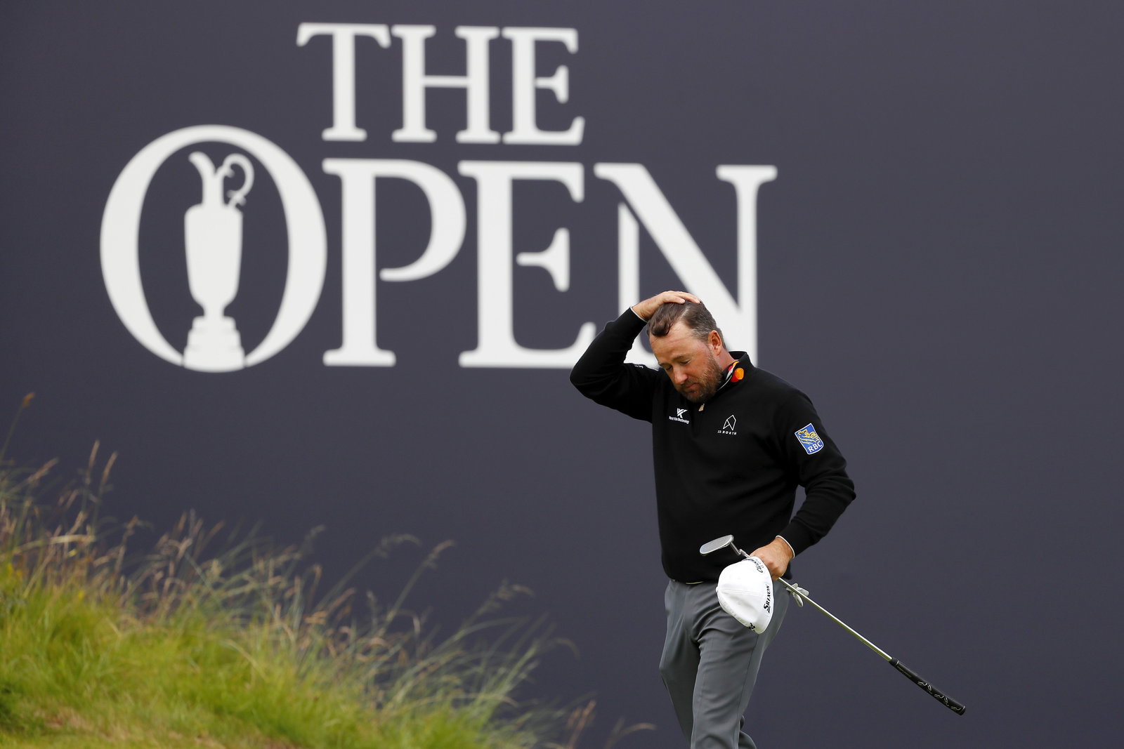 Graeme McDowell takes anger out on golf bag at The Open