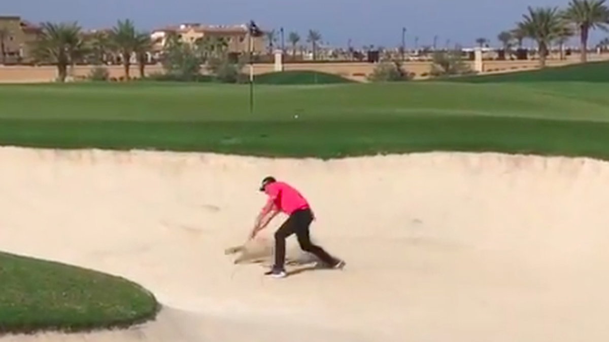 WATCH: Golfer loses plot in bunker... so how many penalty strokes?! 