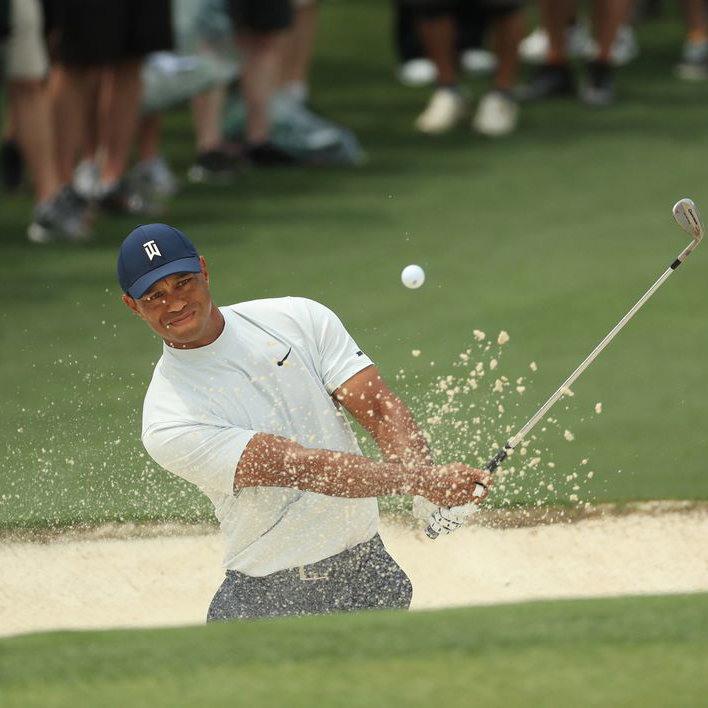 Tiger Woods shows off his strange but very effective bunker drill