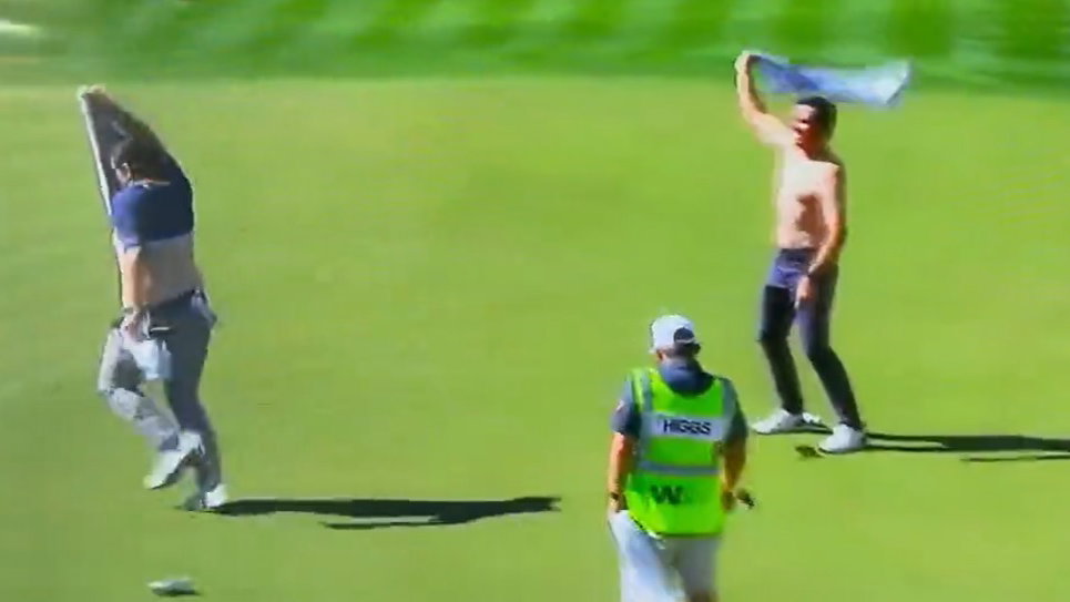 WATCH: Harry Higgs and Joel Dahmen celebrate a par putt by TAKING SHIRTS OFF!