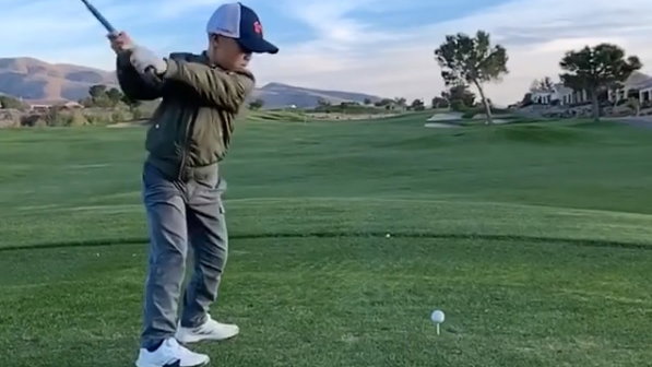WATCH: How much would you pay to have this 8-year-old's golf swing?!