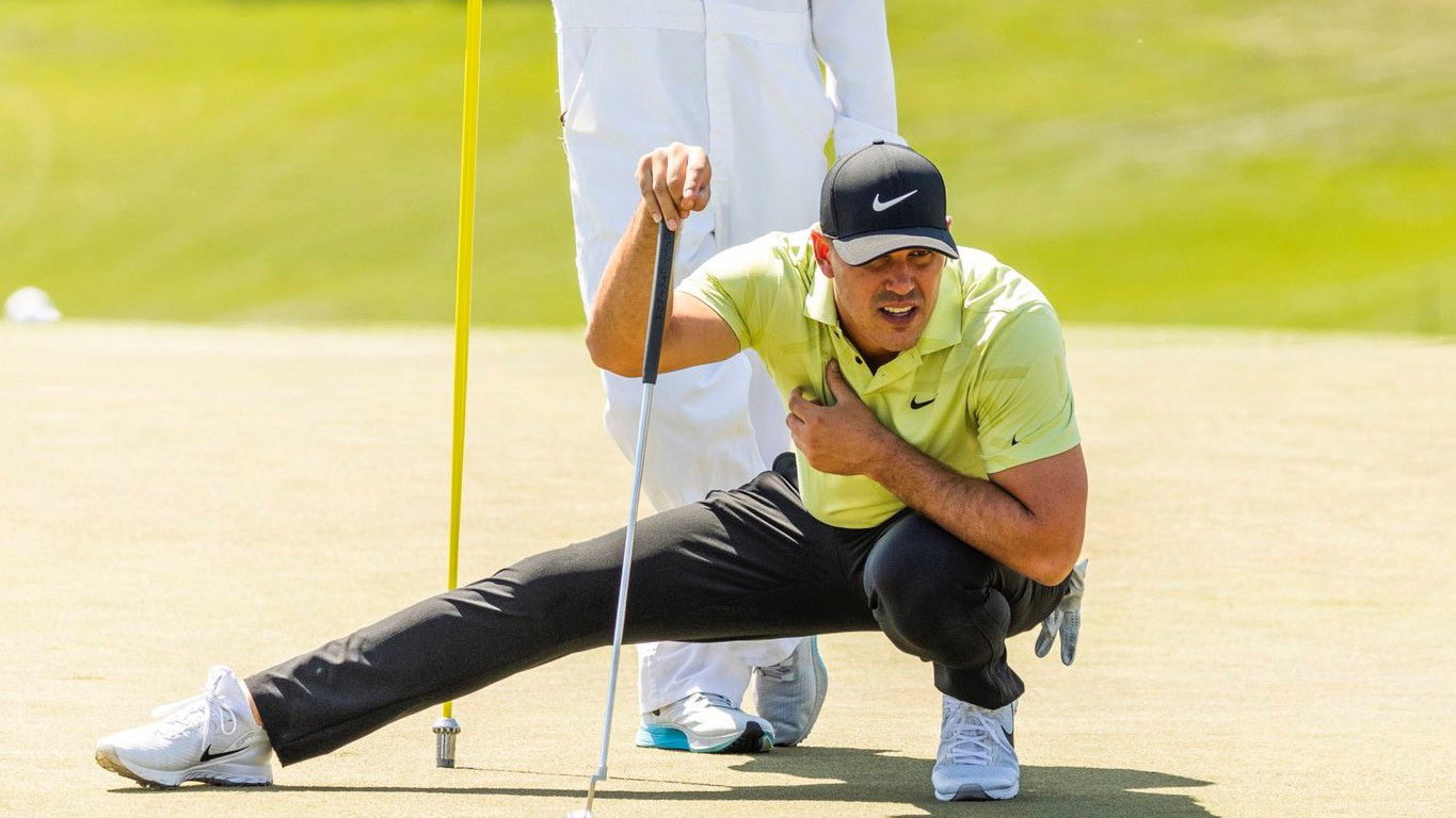 Brooks Koepka fighting through the pain with "funny" way of bending down