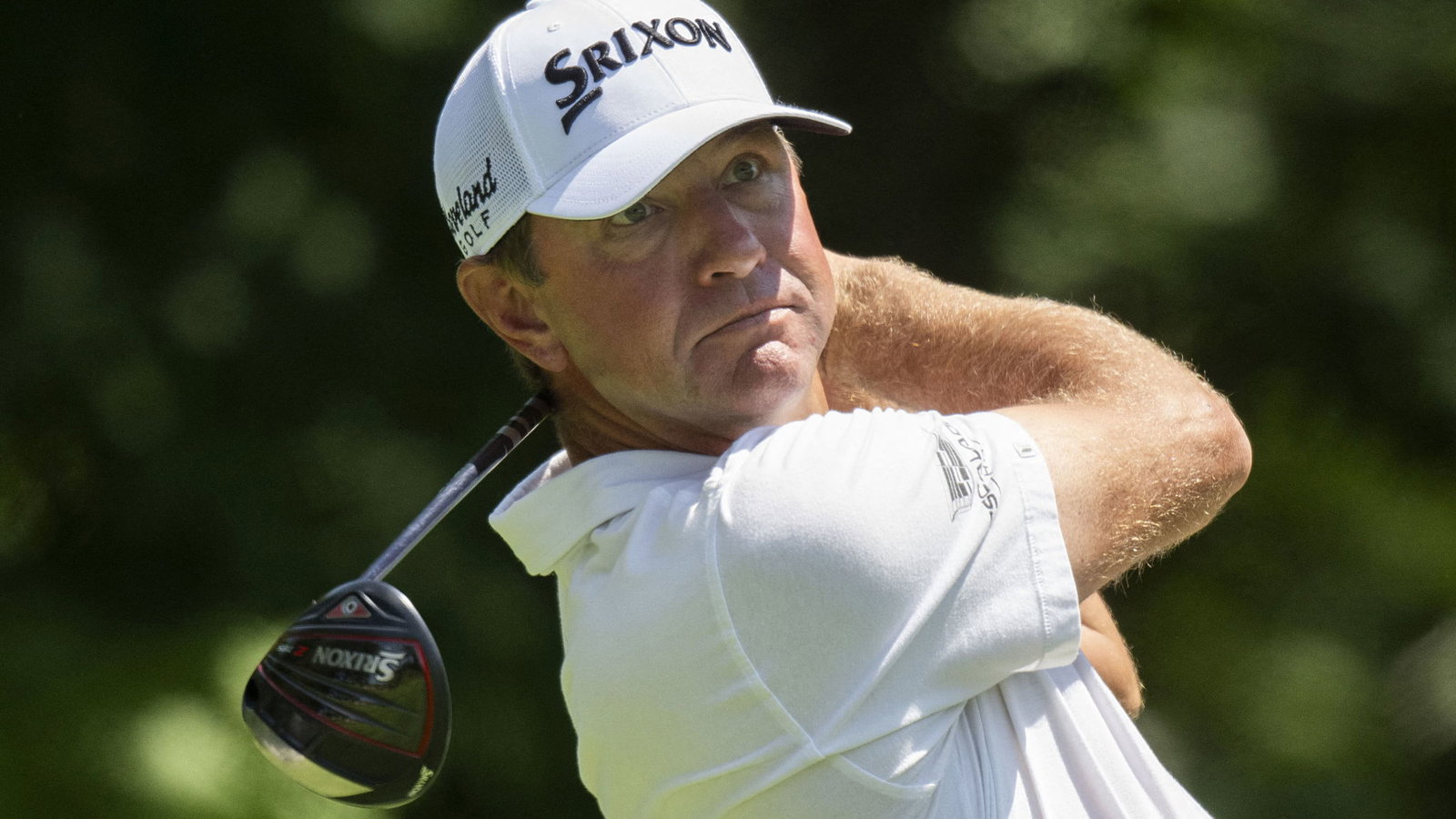 Lucas Glover bounces ball off POLICE CART down 18 en route to fifth PGA Tour win