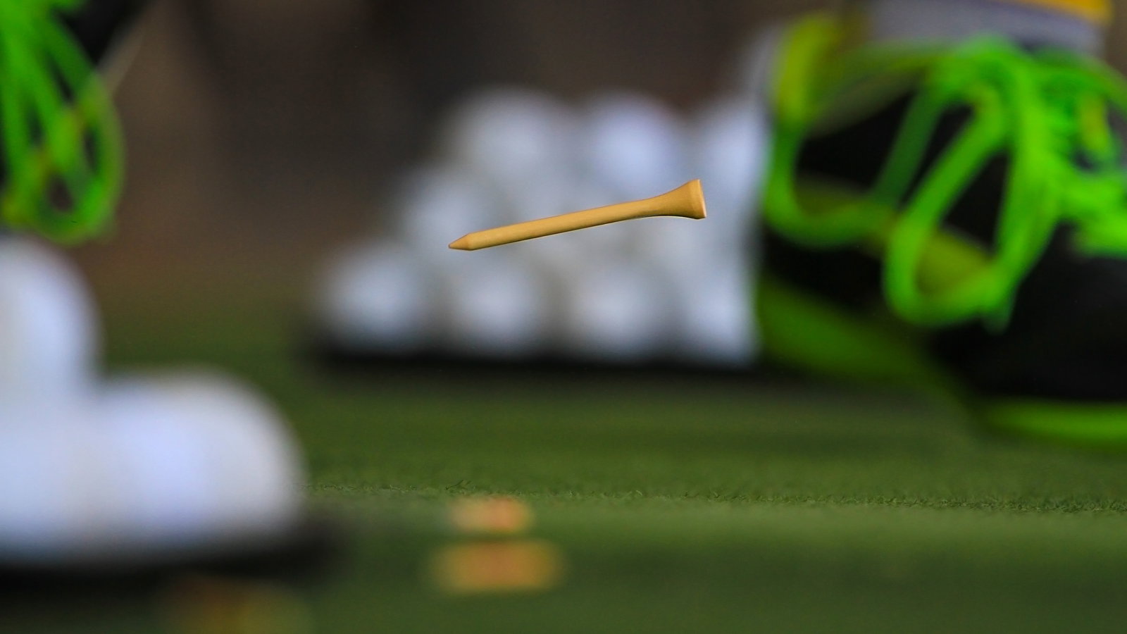 Golfer caught TEEING HIS BALL in the rough during competition