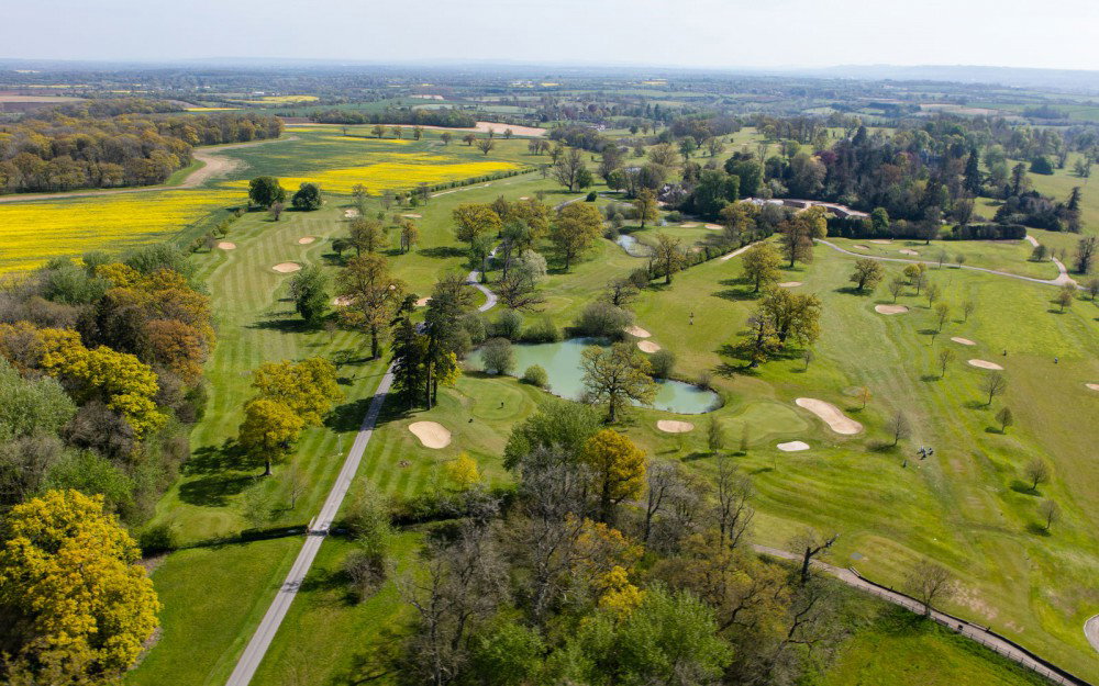 Why do some golf clubs use temporary greens, while others don't?