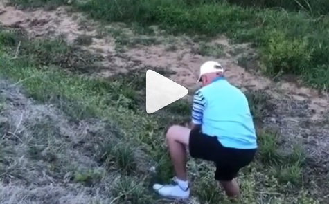 Golfer plays awesome recovery shot, then falls face down a cliff!