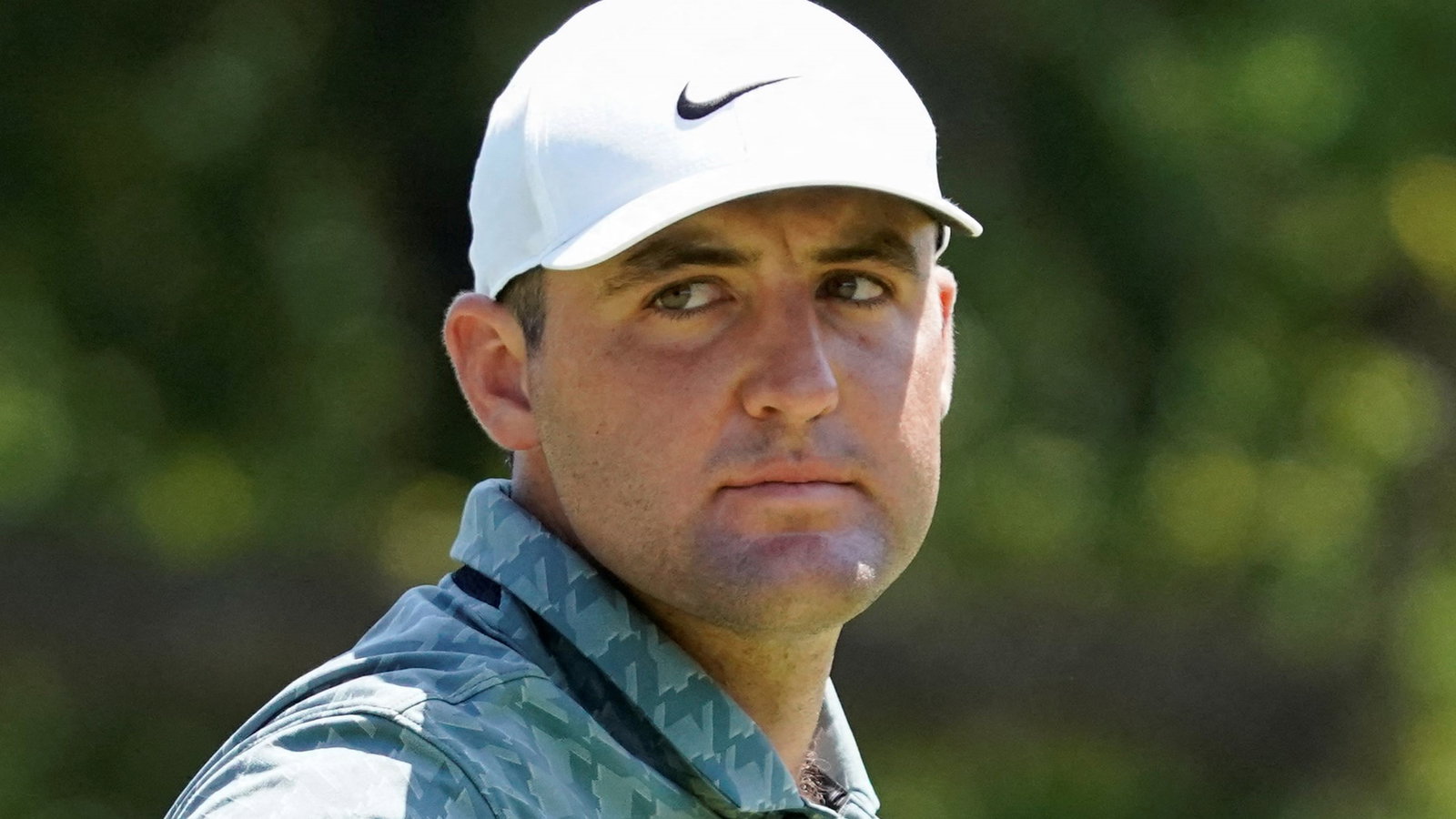 Why is Scottie Scheffler's normal caddie Ted Scott NOT on the bag in Canada?