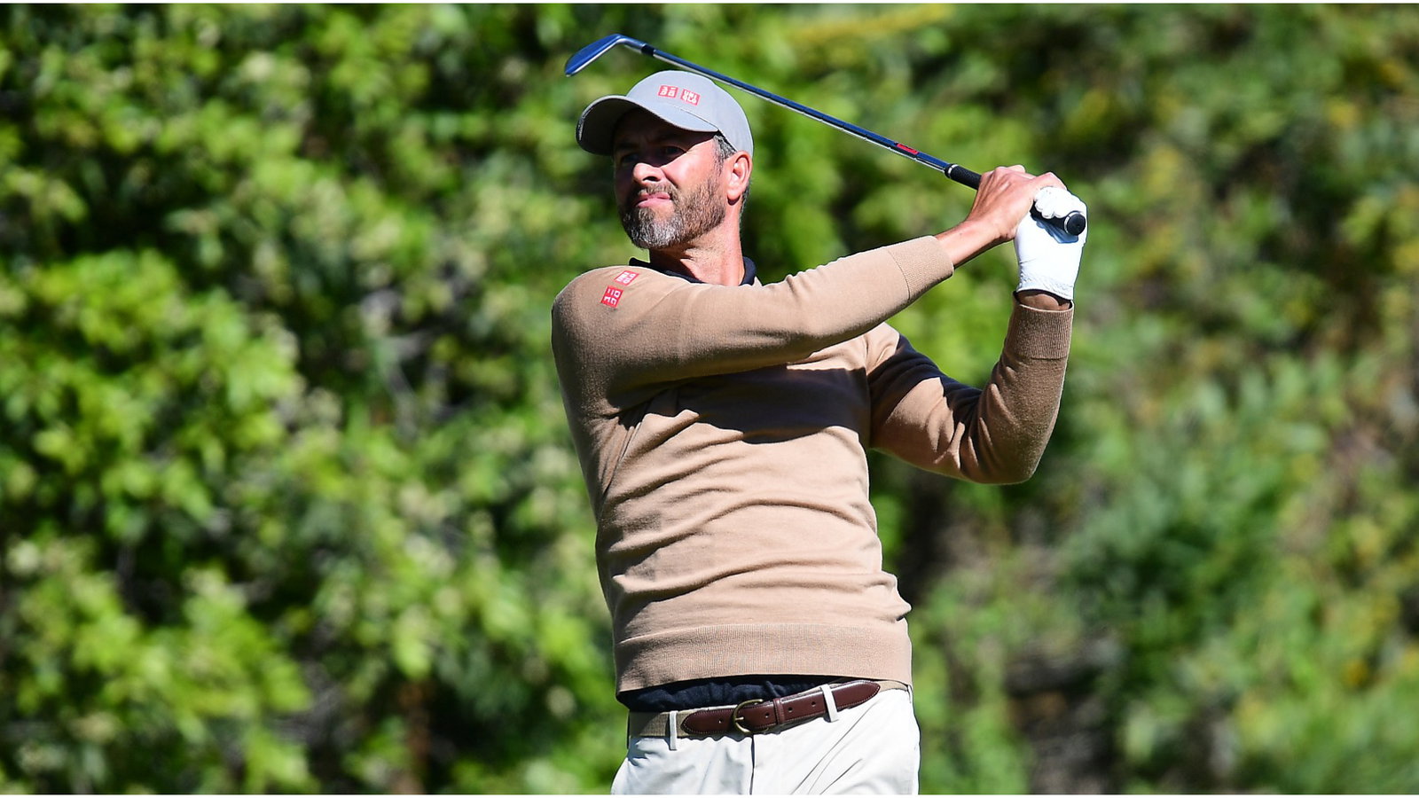 Adam Scott finds water twice, makes quad, then four-hour rain delay came