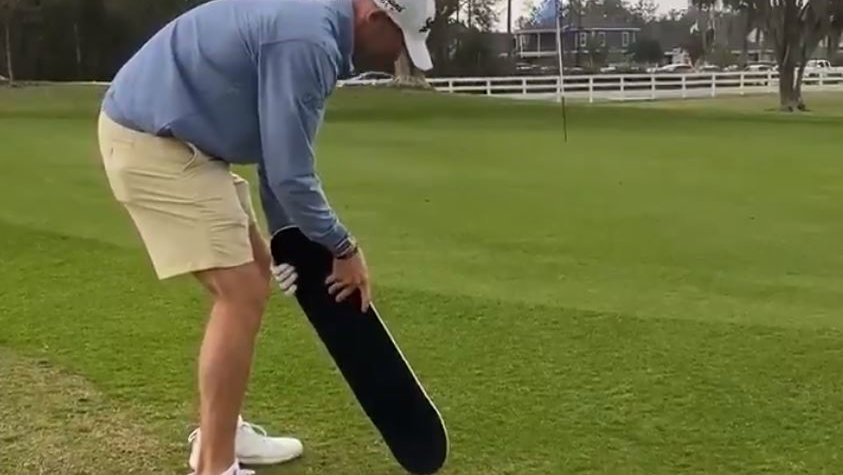 Korn Ferry Tour golfer plays a hole using a SKATEBOARD as a club