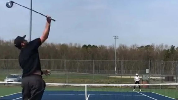 Golf trick shot artist hits ace with golf driver