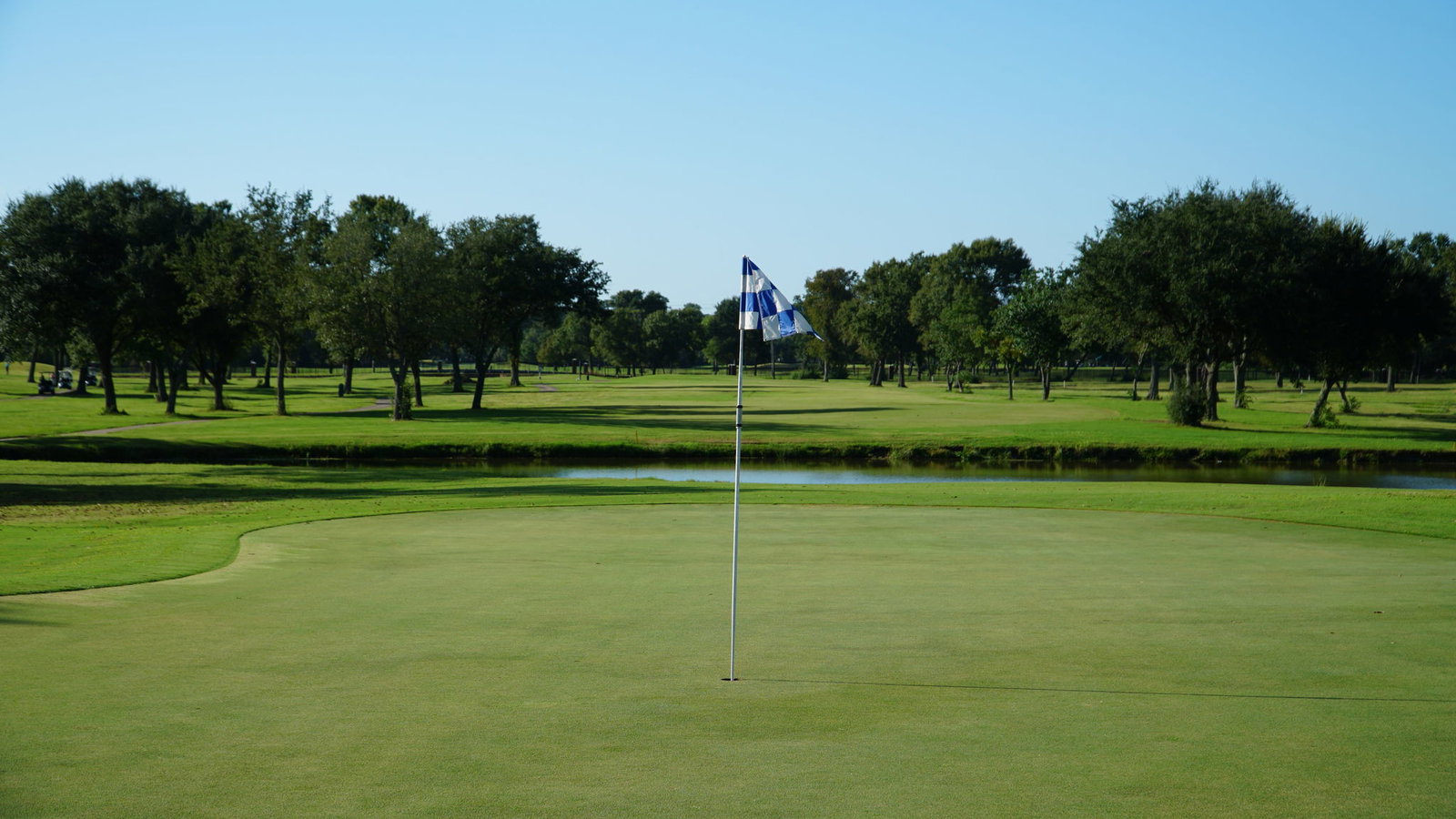 Do you have to place your marker behind the golf ball on the green?