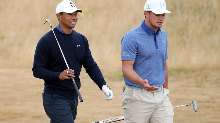 Tiger Woods and Bryson DeChambeau testing each other's golf balls