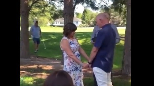 WATCH: Round of golf is interrupted by a WEDDING ceremony!