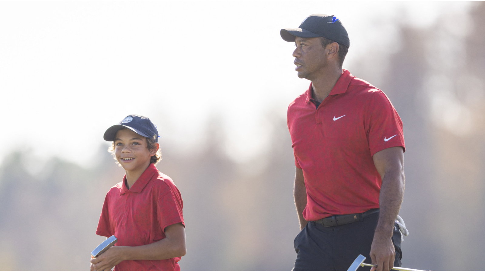 Watch: Tiger Woods DISTRACTING Charlie on the putting green, just like his dad