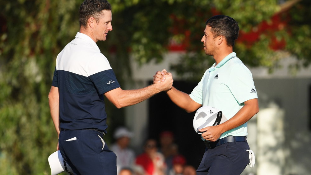 Justin Rose knocks Xander Schauffele's golf ball in the water at WGC-HSBC Champions