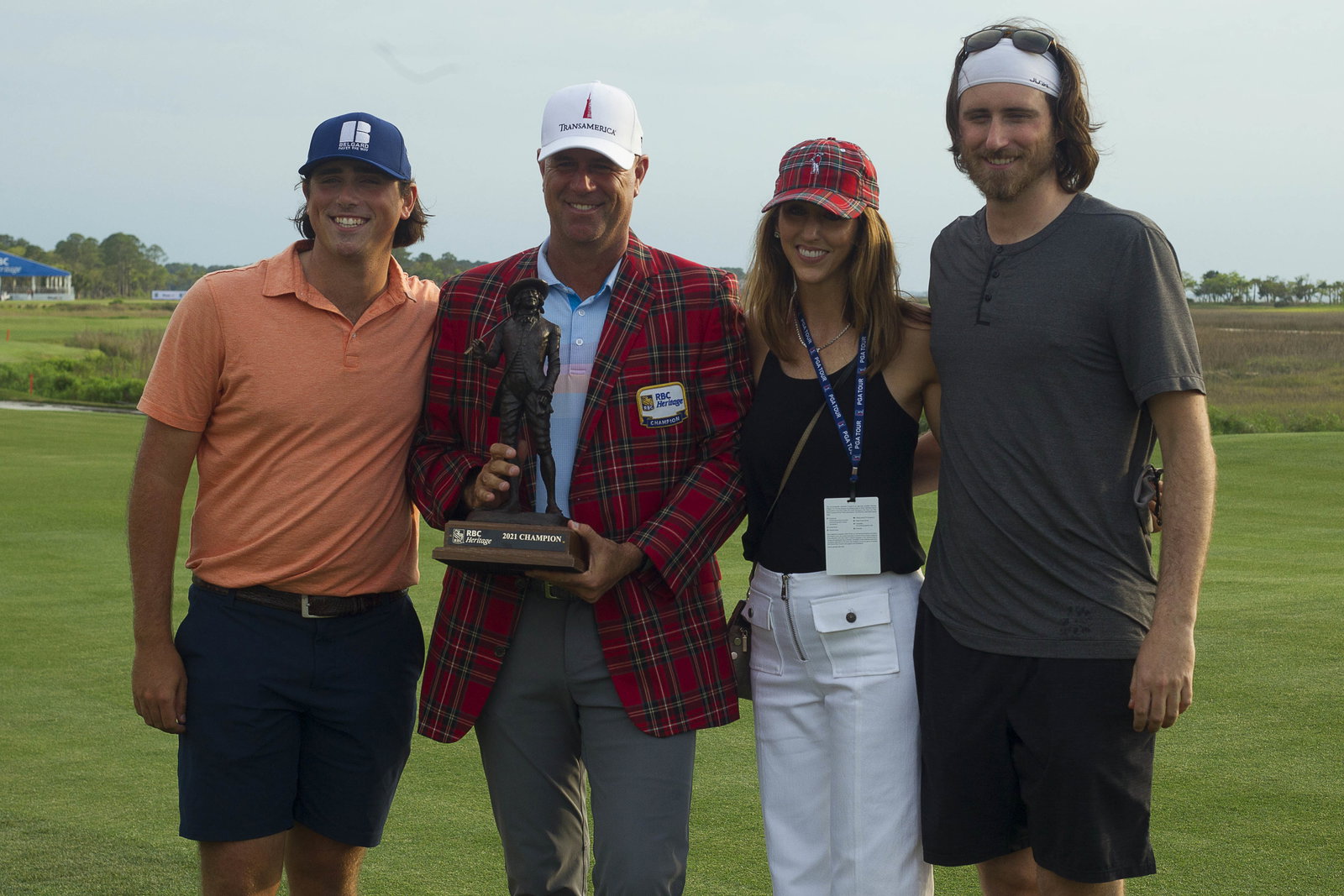 Stewart Cink throws his golf ball in celebration and hits spectator on the head
