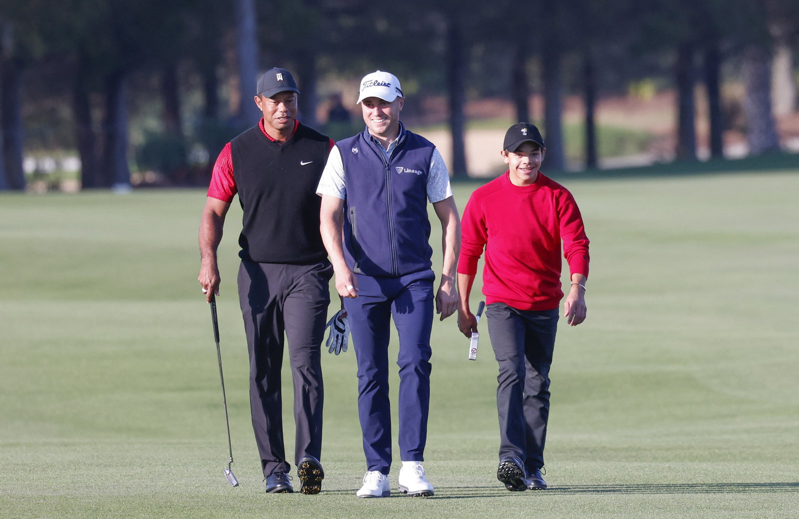 Stunned Tiger Woods shakes his head after Charlie inadvertently trolls him